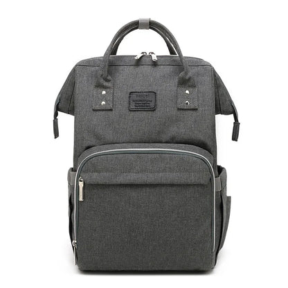 Detail of insulated side pocket on a multifunction baby nappy backpack, parenting essential