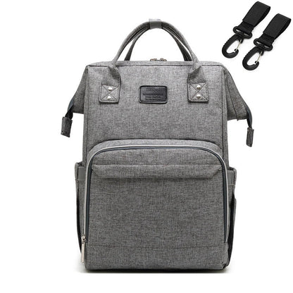 Unisex diaper bag with large main compartment, perfect for bottles and clothing