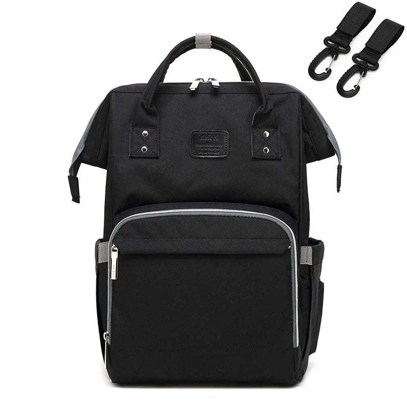Front view of a black unisex multifunction nappy backpack, sleek and practical design