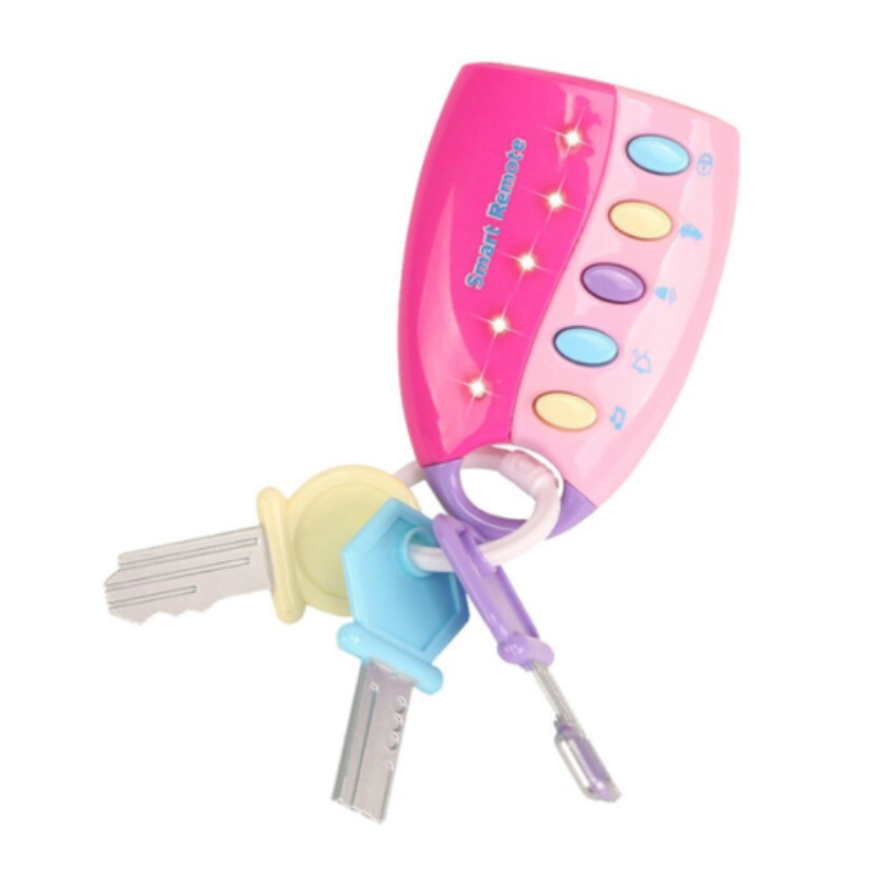 Toddler playing with a pretend musical key and remote set, a fun unisex educational toy