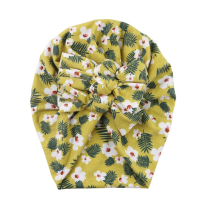 Delicate floral print baby beanie, soft and breathable for a newborn's head