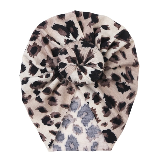 Unisex newborn beanie, adorned with a sweet floral print, excellent for photos