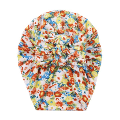 Unisex baby hat with an all-over floral print, comfortable and trendy newborn accessory