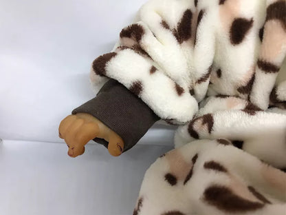 Horizontal shot of a cozy 'Newborn Romper' for babies, made from soft flannel with cotton filling