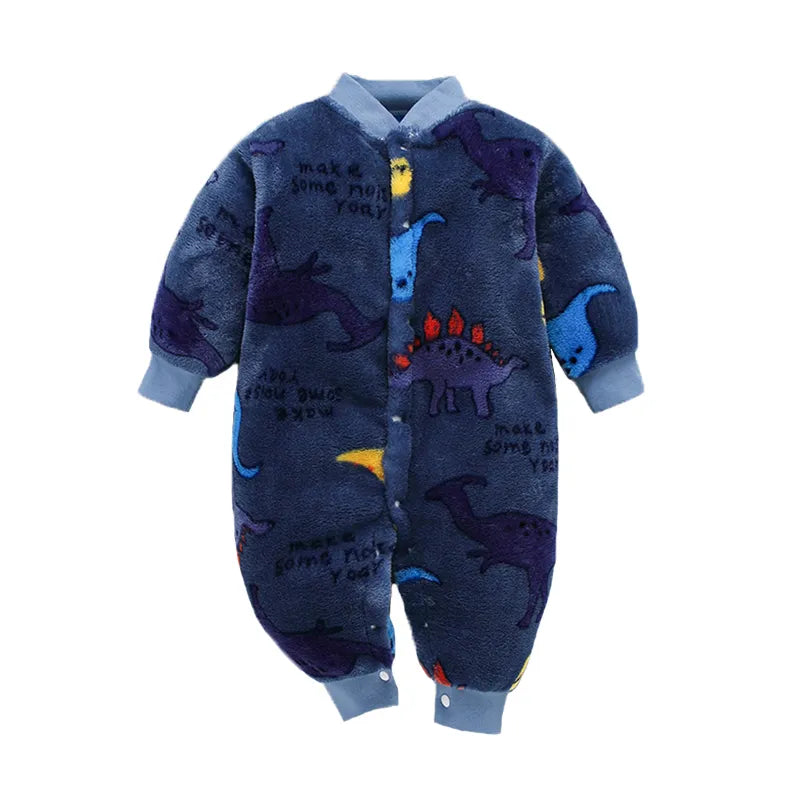 Unisex newborn baby in a lying position wearing a cozy flannel romper, 'Spring Baby' attire