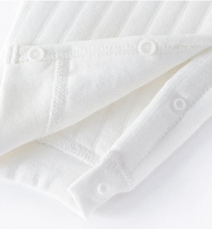 Unisex baby jumpsuit made from breathable cotton, ideal for seasonal layering