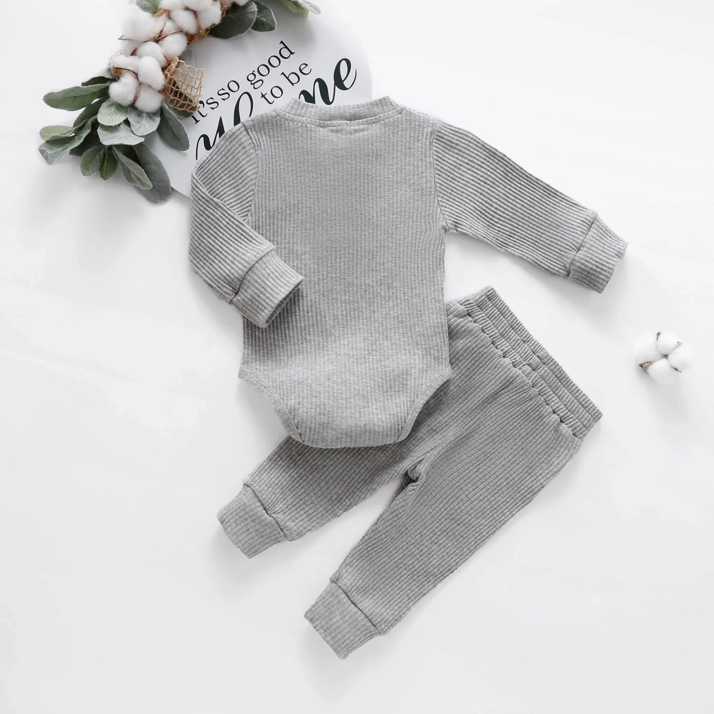 Gift set of unisex newborn knit romper and pants, essential baby wear