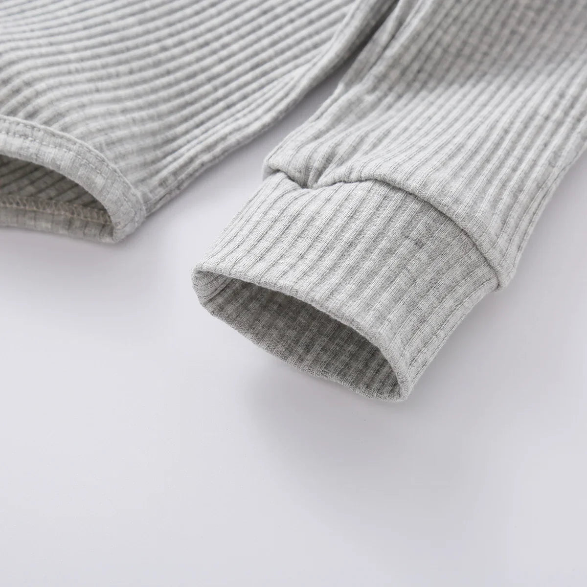 Beige knit long sleeve two-piece set for infants, unisex baby fashion
