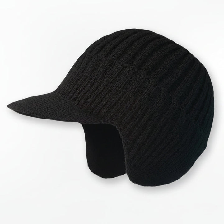 Man wearing a stylish Nordic winter hat, looking warm & comfortable. Perfect fit beanie for men's winter fashion.
