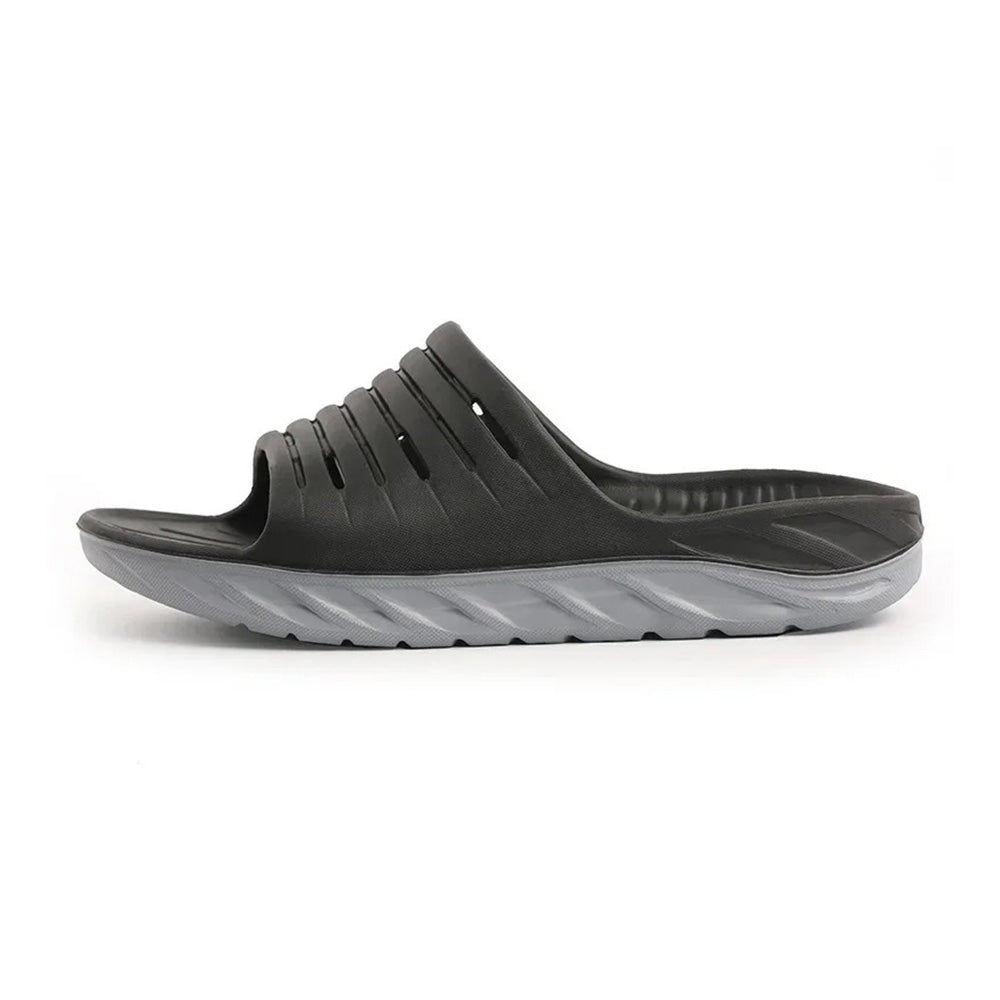 Unisex orthopedic arch support slides for foot pain relief, ideal for plantar fasciitis & heel pain recovery.