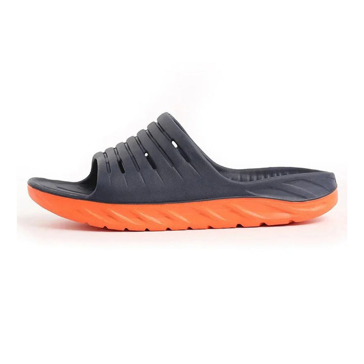 Comfortable unisex orthopedic slides with strong arch support & shock absorption for everyday foot pain relief.