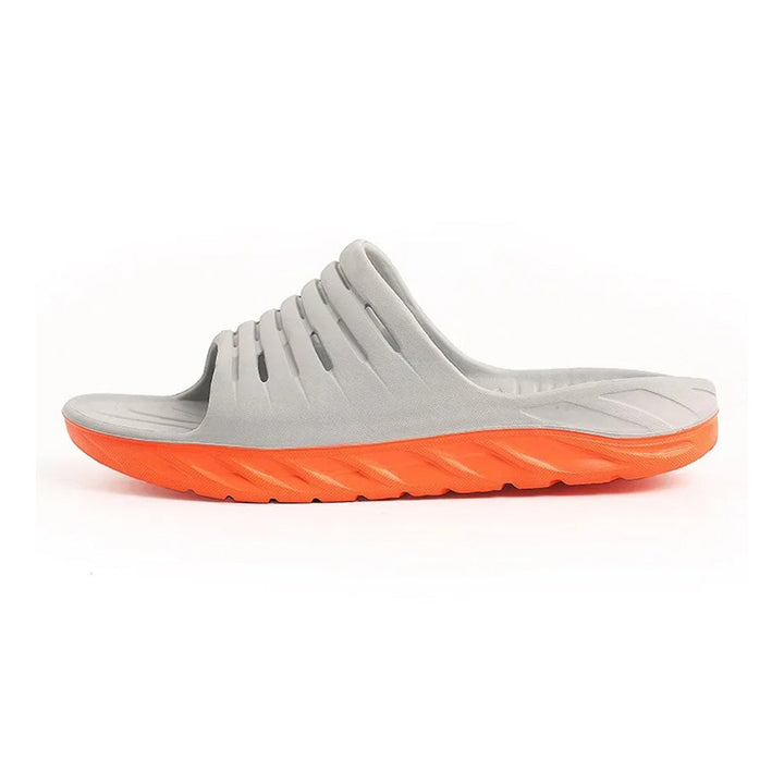 Orthopedic slides with deep arch support, cushioning for foot pain, plantar fasciitis & recovery. Unisex design.
