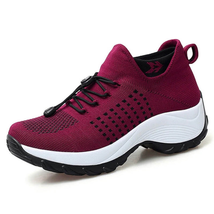 Shock-absorbing unisex orthopedic shoes for active lifestyles, offering comfort & pain relief.