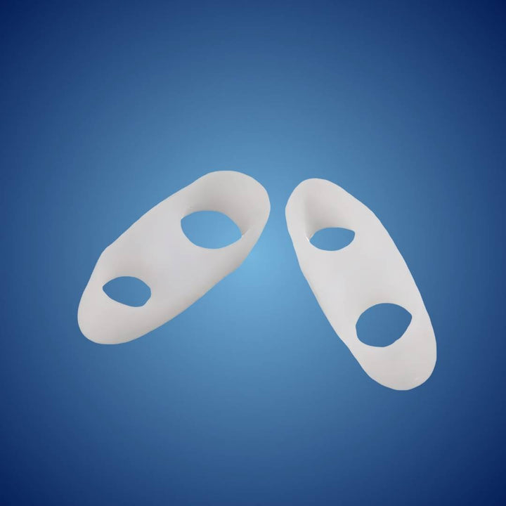 Soft silicone toe separators correcting bunions & hammertoes, providing foot pain relief & alignment.