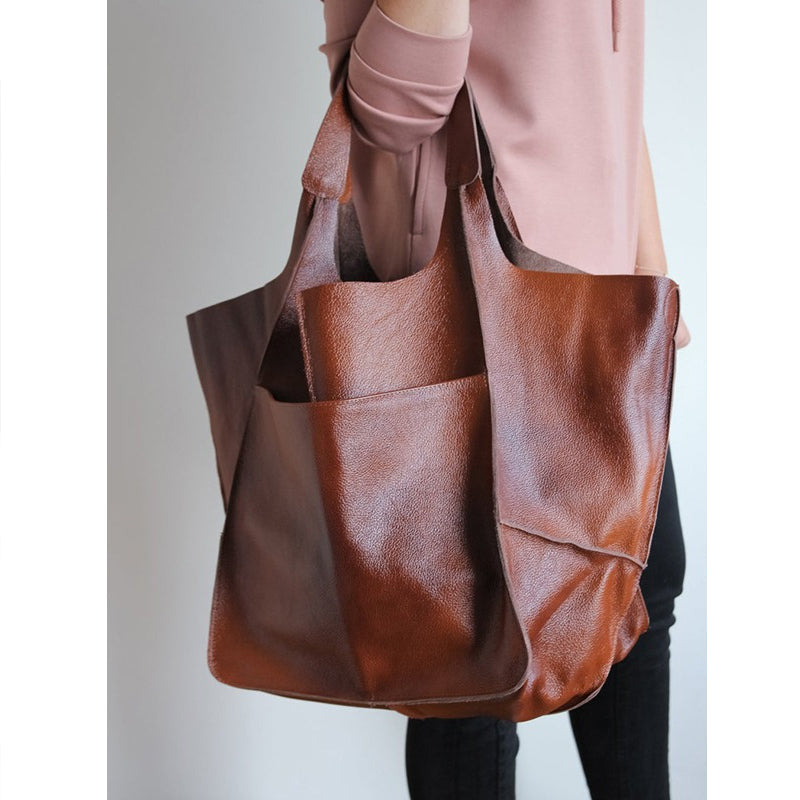 From airport to resort: a stylish unisex oversized travel duffel bag, your ultimate weekend companion.
