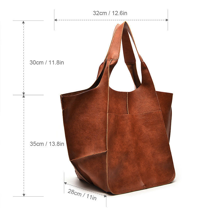 Large capacity unisex travel duffel. This oversized weekender bag is your ideal carry-on companion.