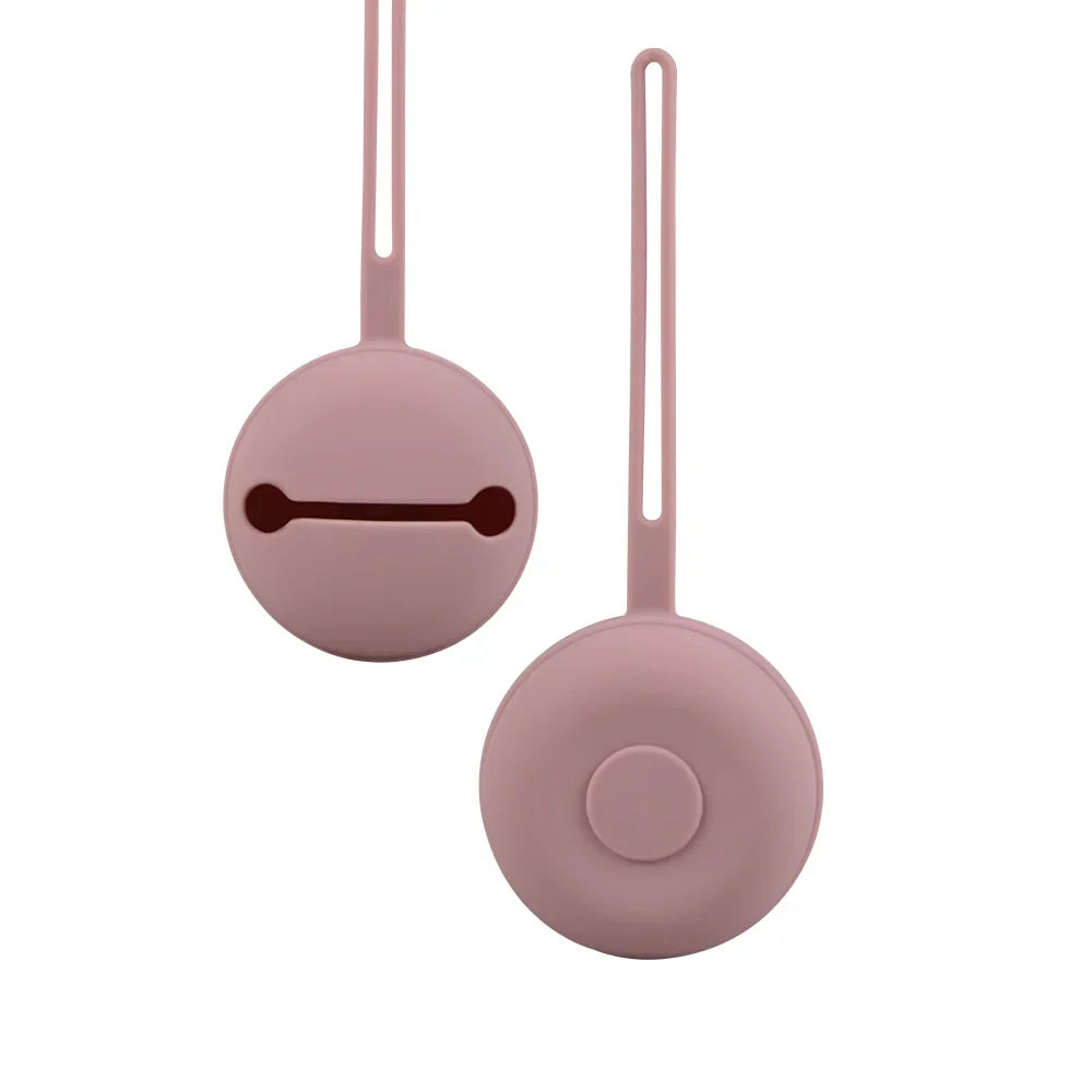 Open silicone pacifier holder revealing empty interior, illustrating storage capacity.