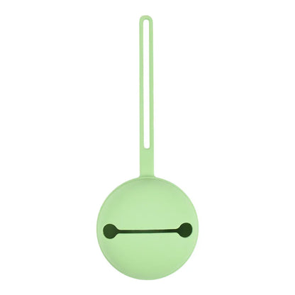 Silicone pacifier holder attached to a diaper bag, showcasing portability and use.