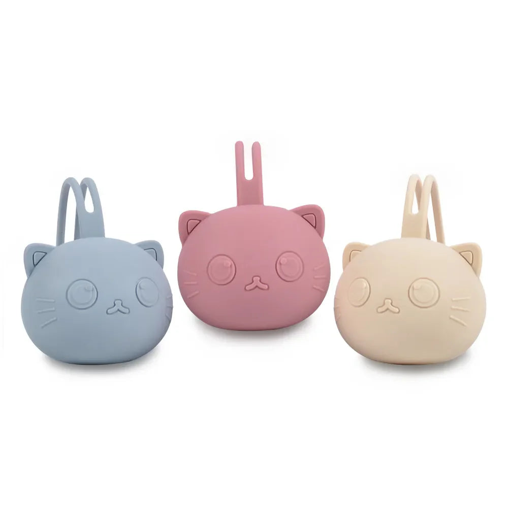 Green portable silicone pacifier case, durable baby essential for infant care.