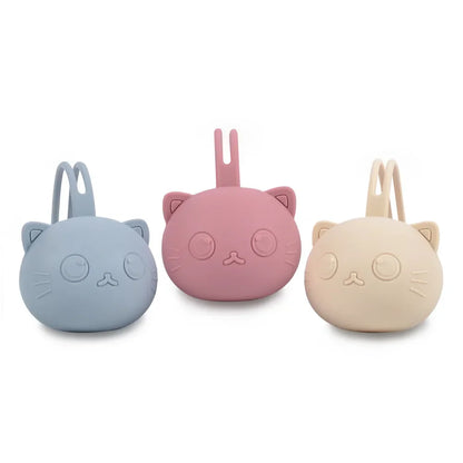 Green portable silicone pacifier case, durable baby essential for infant care.