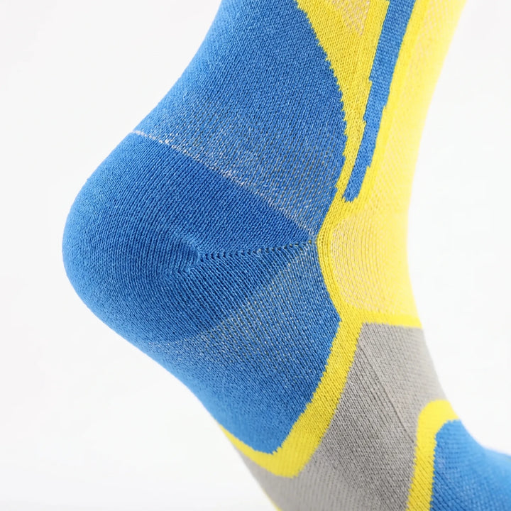 Supportive unisex knee-high athletic socks, ideal for activewear, workouts, & enhanced performance.