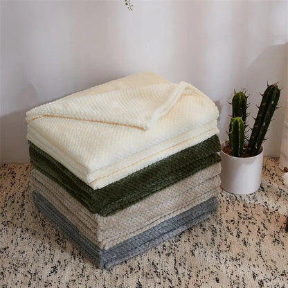 Unisex baby quilt with charming pineapple plaid, essential for newborn comfort & warmth