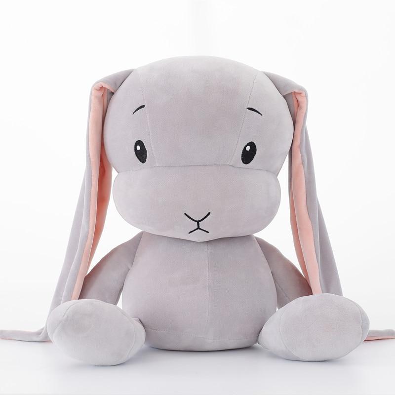 Close-up of a cozy plush bunny toy, perfect unisex cuddle buddy for nursery decor.