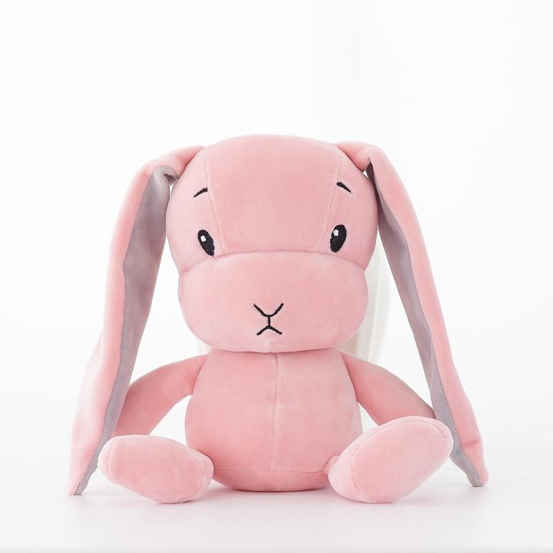 Unisex cuddle bunny toy, an adorable and super soft plush rabbit for infant play and comfort.