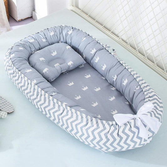 Unisex portable baby lounger & snuggle nest, white with grey trim, soft and supportive for newborns