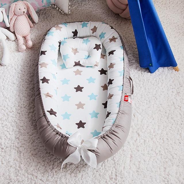 Soft sleep surface: portable baby lounger & snuggle nest, neutral colors for any nursery decor