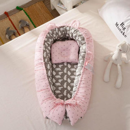 Ergonomic portable baby lounger, snuggle nest for newborn safety and comfort, soft grey fabric