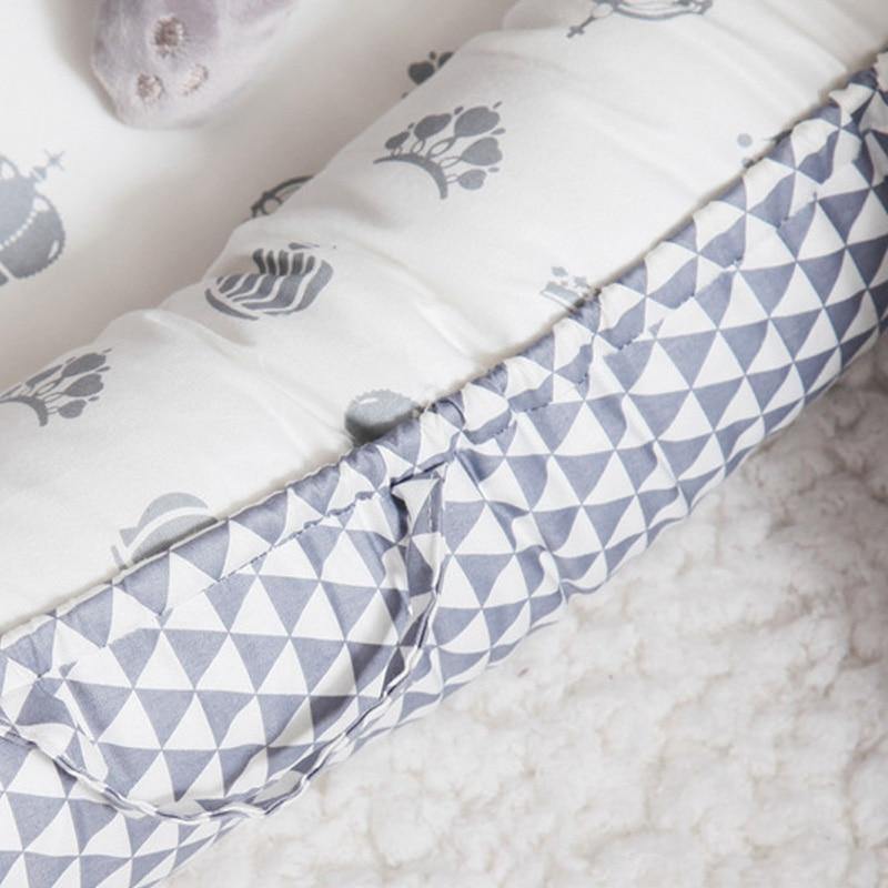 Portable baby crib alternative, snuggle nest for newborns, easy to carry travel bed, grey & white