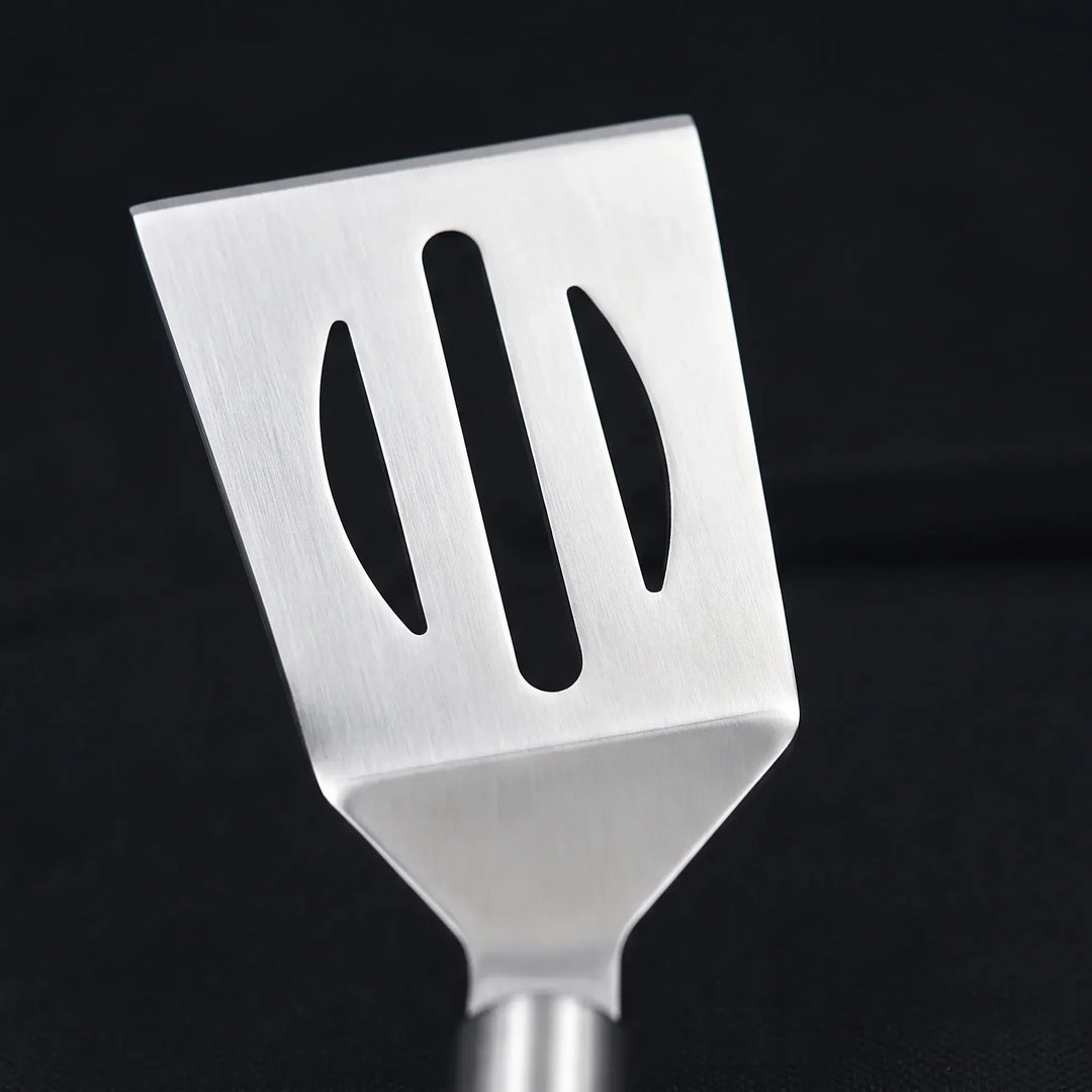 Complete portable BBQ tool set for cookouts, featuring durable stainless steel grilling utensils.