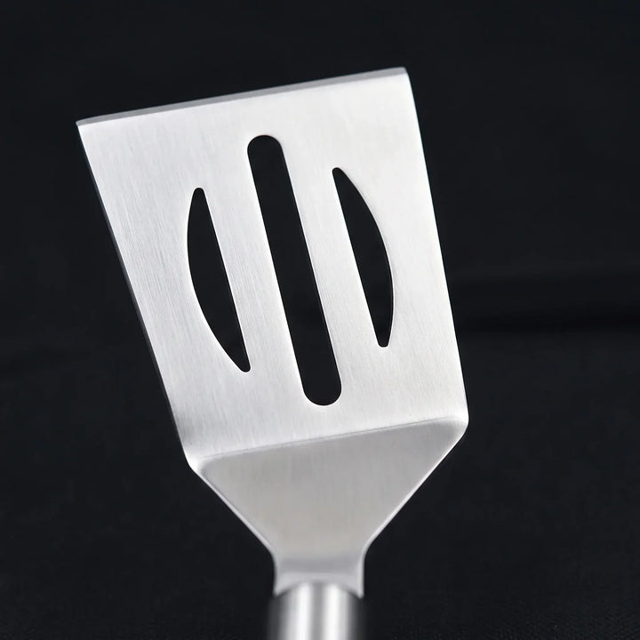 Complete portable BBQ tool set for cookouts, featuring durable stainless steel grilling utensils.