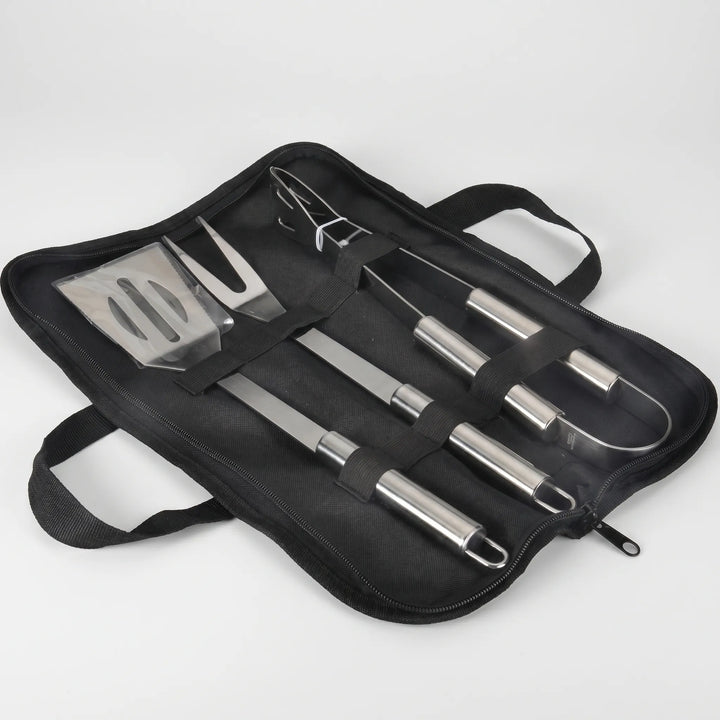 Grilling accessories set with spatula, tongs & fork, ideal for any portable grill or backyard BBQ.