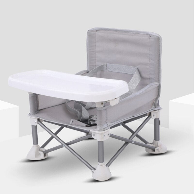 High-back portable booster seat in a modern design, providing comfortable and secure seating for toddlers