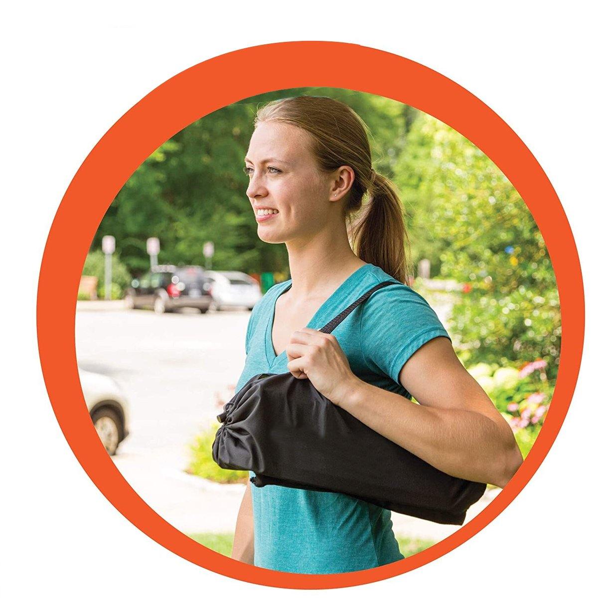 Portable highchair alternative, a gray booster seat with a 5-point harness, ensuring child safety