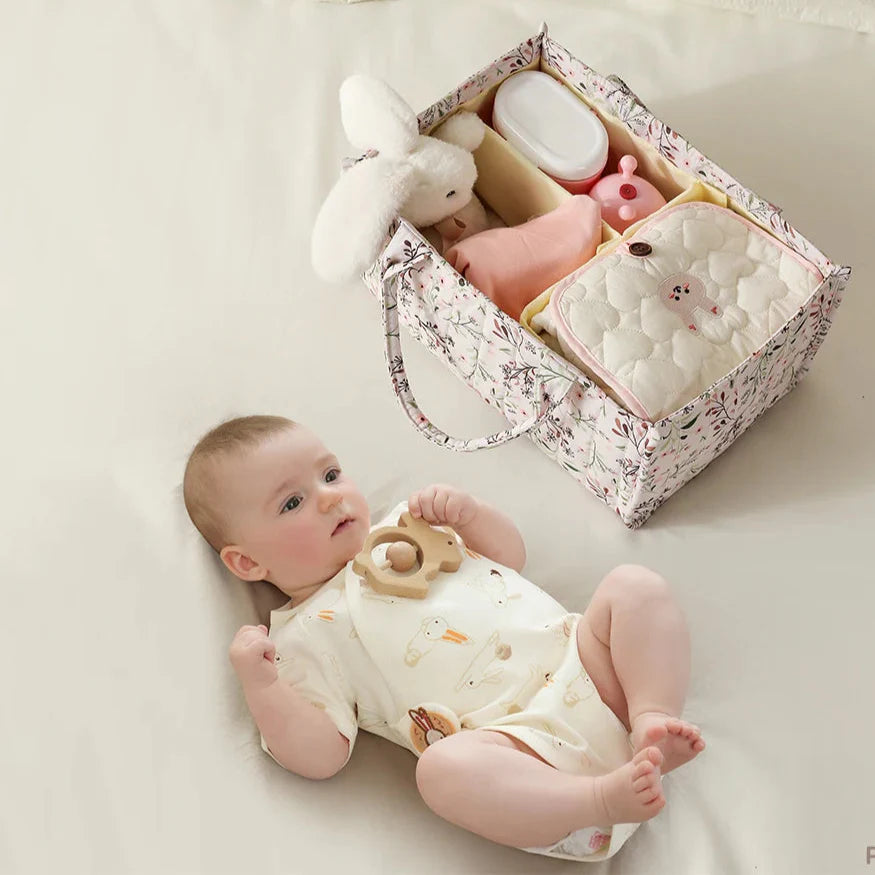 Unisex portable diaper organizer bag with compartments for nursery storage, beige polyester