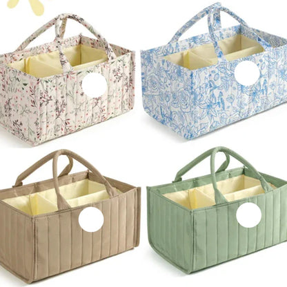 Baby diaper caddy with handles, perfect for organizing baby essentials in nursery or car