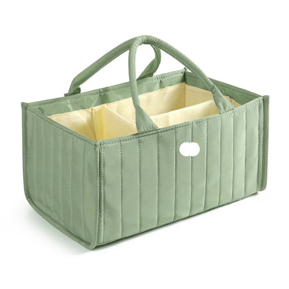 Close-up of the durable polyester fabric of a unisex portable diaper organizer bag
