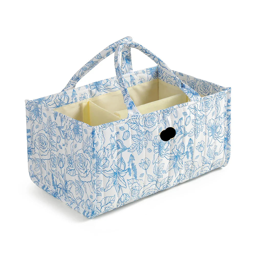 Diaper organizer bag with ample space for baby necessities, handles for easy transport