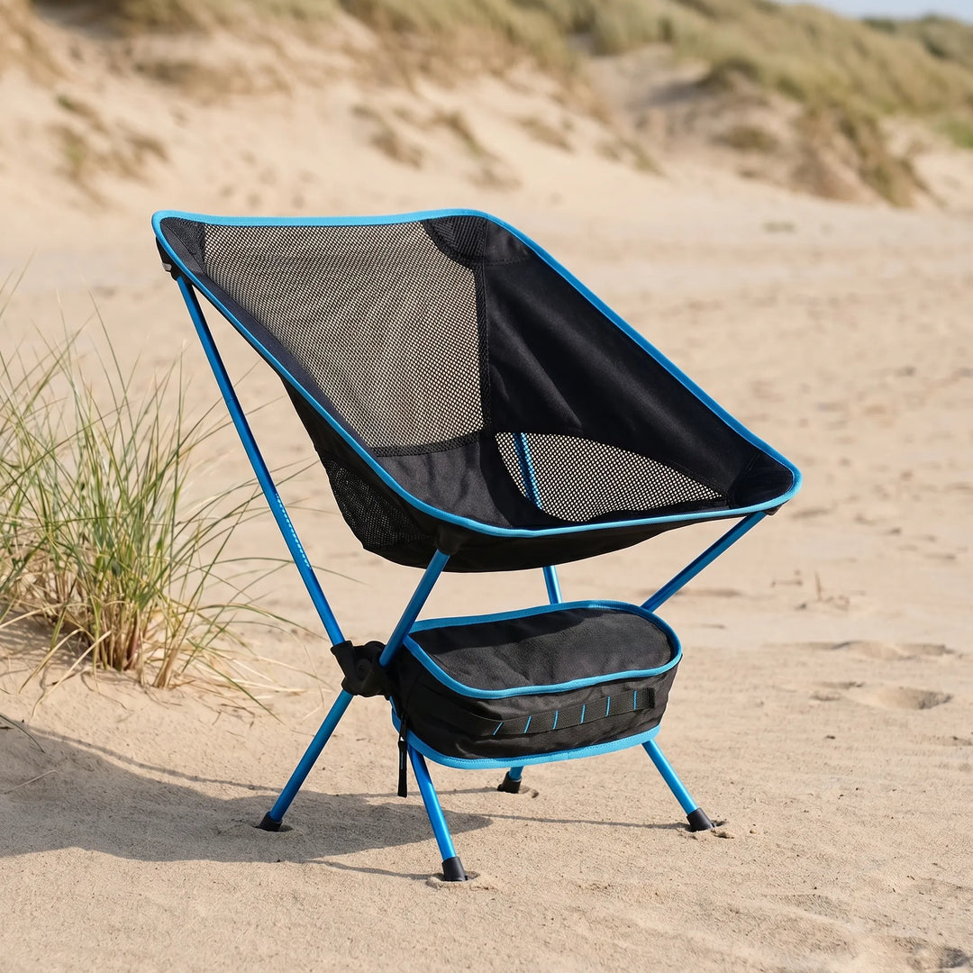 Unisex portable folding camp chair for outdoor adventures. Lightweight design for camping, hiking, or beach use.