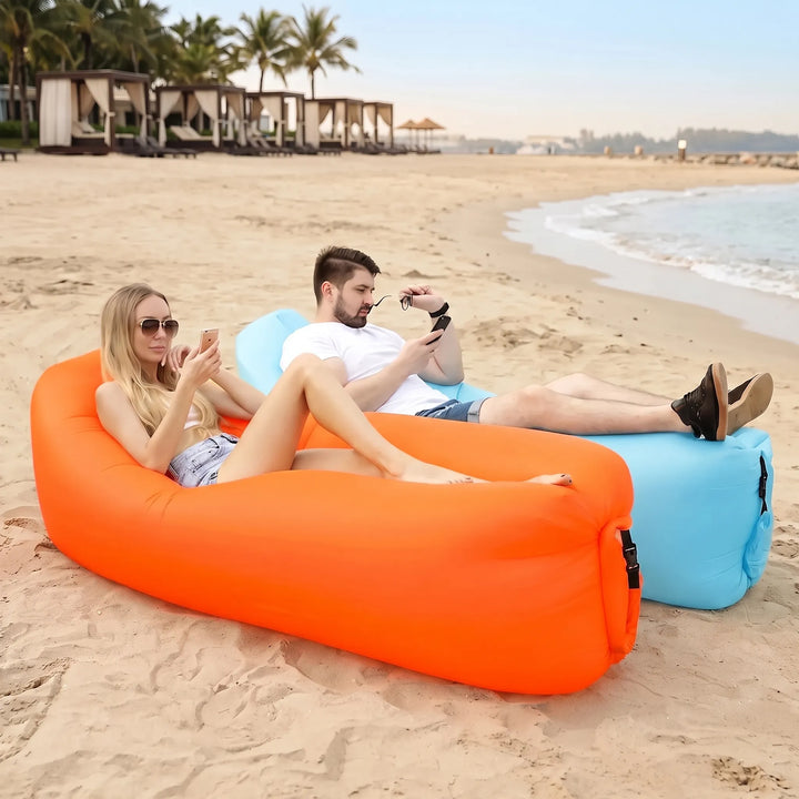 Unisex portable inflatable air lounger for outdoor relaxation, perfect for beach, park, or camping. Easy setup.