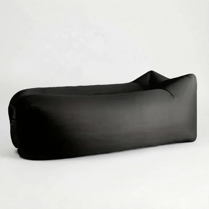 Stylish green portable air lounger for unisex outdoor relaxation, an excellent travel sofa for any adventure.