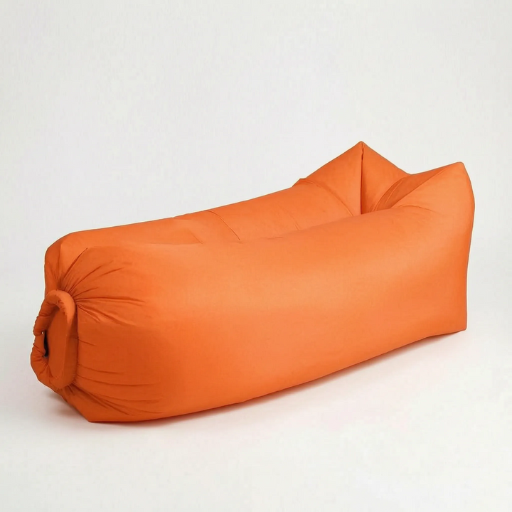 Relaxing portable beach lounge chair. This no-pump inflatable air sofa is perfect for sunbathing and outdoor napping.