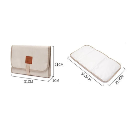 Grey portable baby changing station, waterproof and easy to clean, a newborn essential