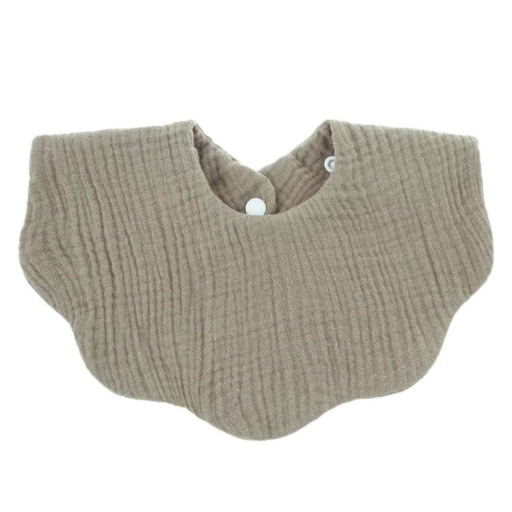 Unisex premium soft cotton baby bib in a pastel blue, great for infant drooling and feeding times