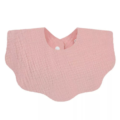 Folded premium soft cotton baby bib, unisex, showing compact design for travel and storage