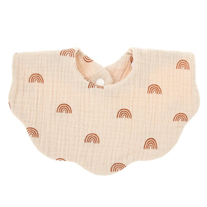 Newborn wearing a white premium soft cotton baby bib with a cute animal print, preventing drool stains
