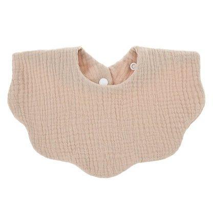 Premium soft cotton baby bib in a neutral cream color, unisex, essential for everyday infant use